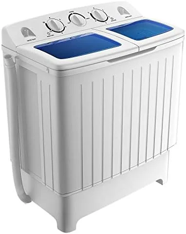 The two tubs of the washer, wash side and spinner side