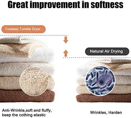 A small load of towels tumbling inside the dryer drum