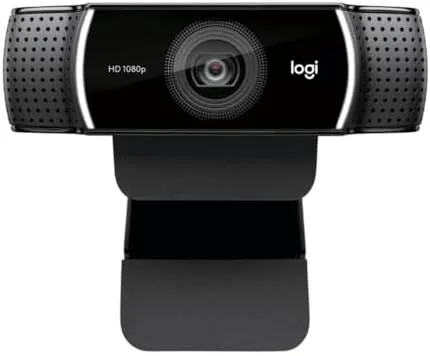The C922 Pro webcam mounted on a monitor in a streaming setup