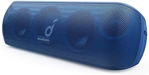 Soundcore Anker Motion+ portable speaker leaning against a pool edge