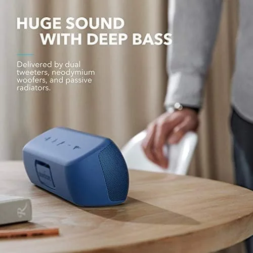 Two Soundcore Motion+ speakers paired for stereo on a table