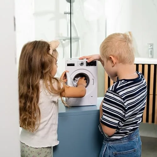 Close up of the open door showing the drum inside the toy washer