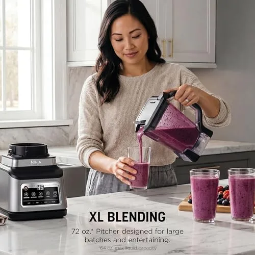 The 72 ounce pitcher blending a green smoothie with Auto-iQ running