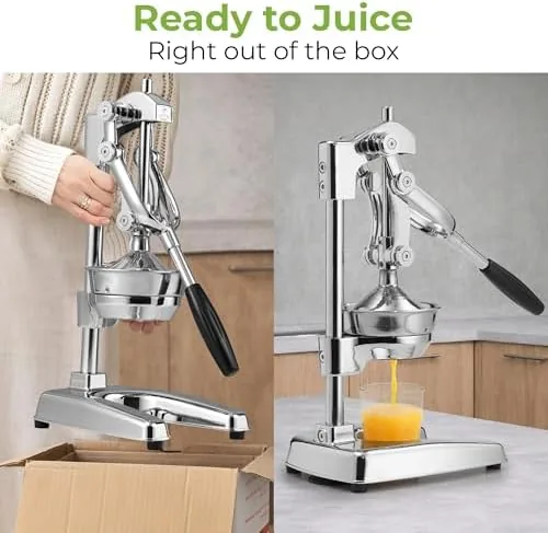 An orange half being pressed under the lever with juice flowing into a glass