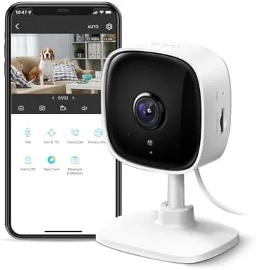The Tapo C100 camera mounted on a shelf overlooking a nursery crib
