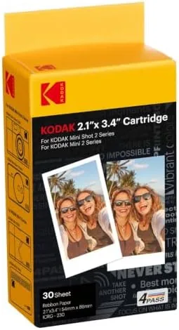 Finished 2x3 prints arranged with the KODAK cartridge box, showing the print quality