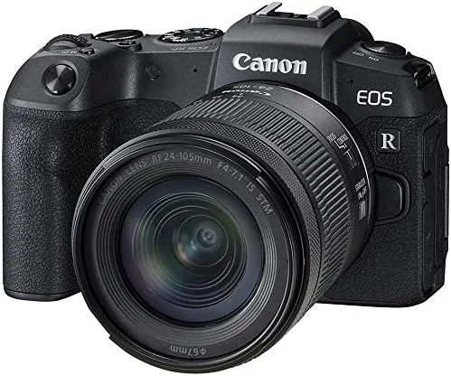 The Canon EOS RP with the RF24-105mm lens mounted, sitting on a table