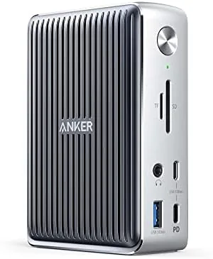 The Anker 577 docking station on a desk beside a laptop and monitor