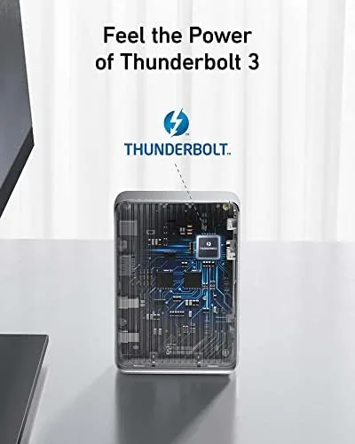 A laptop connected to two 4K monitors through the Anker 577 on a desk