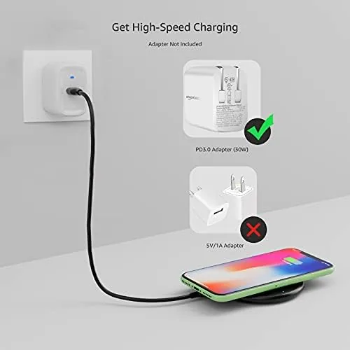 A smartphone in a case placed on the charging pad