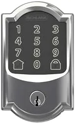 Bright chrome Greenwich deadbolt beside a satin nickel lock for comparison