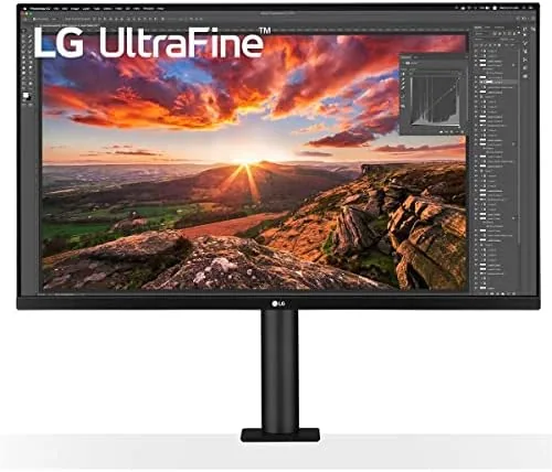 LG 32UN880-B Ultrafine monitor mounted on a desk with the C-clamp Ergo stand