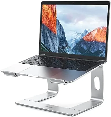 BESIGN LS03 aluminum laptop stand assembled on a desk with a laptop at full height