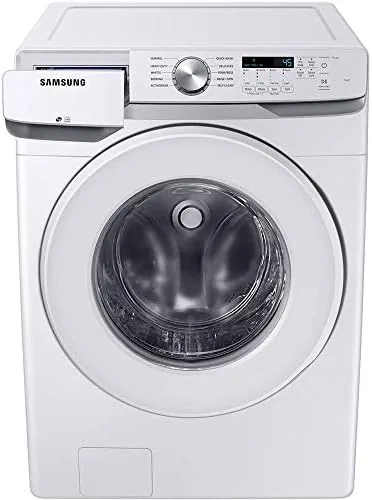 A full laundry basket beside the loaded washer drum ready to start a cycle