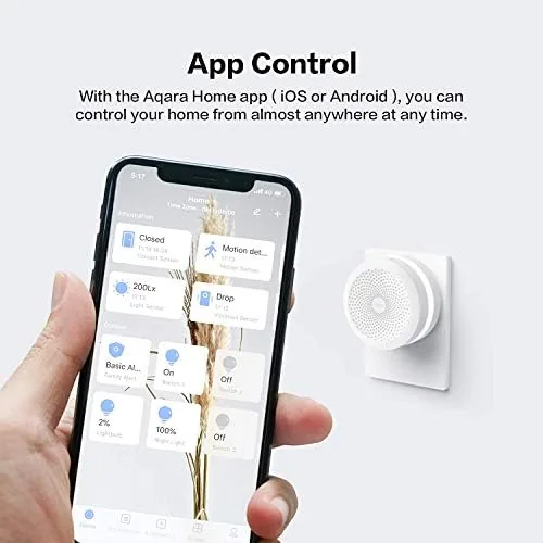 The Aqara hub beside a generic Zigbee bridge and a brand hub for size comparison