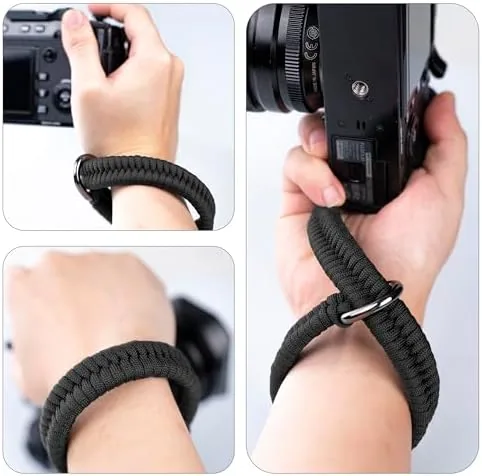 A street photographer using the wrist strap while shooting handheld