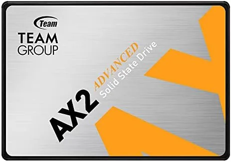 The TEAMGROUP AX2 1TB SATA SSD drive on a workbench