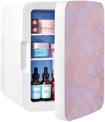 Interior shelves of the Cooluli fridge holding a can of soda and small skincare bottles