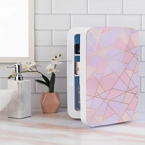 A college dorm room setup with the pink Cooluli mini fridge on a shelf