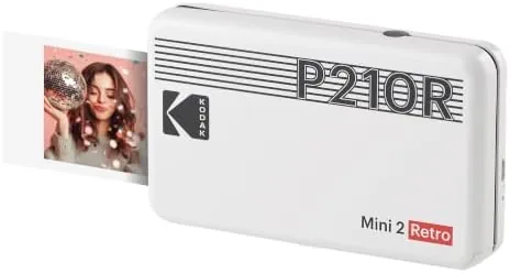 The open clamshell of the KODAK Mini 2 Retro showing the installed cartridge