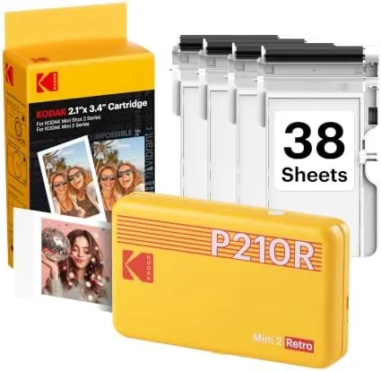 Several KODAK Mini 2 Retro prints arranged on a table showing color variety