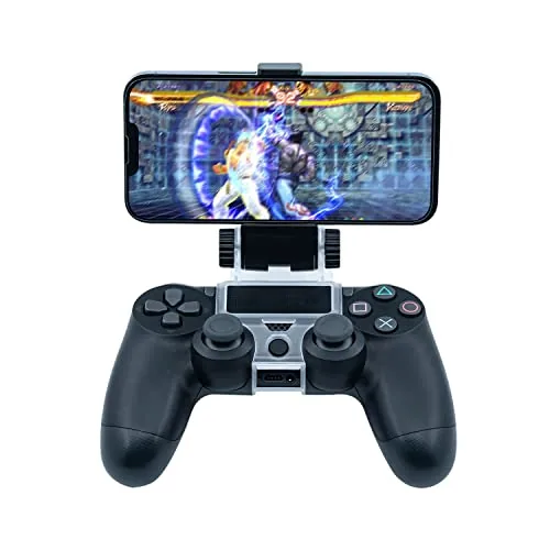 A hand holding the DualShock 4 with the phone mounted during a gaming session