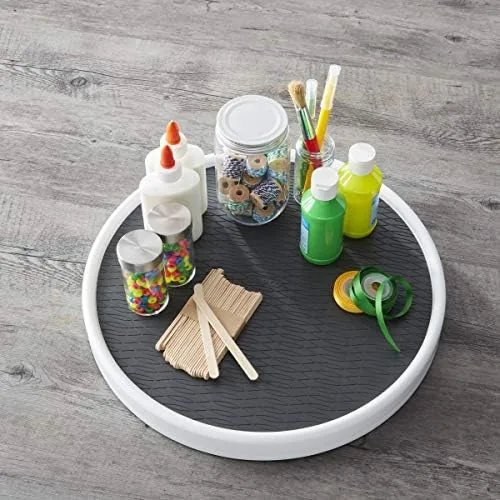 Spinning the loaded lazy susan one handed in a pantry