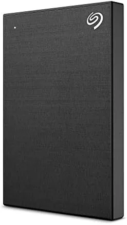 Seagate One Touch 2TB external hard drive on a desk next to a laptop