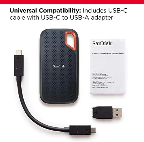 A laptop connected to the SanDisk drive with a single USB-C cable during a transfer