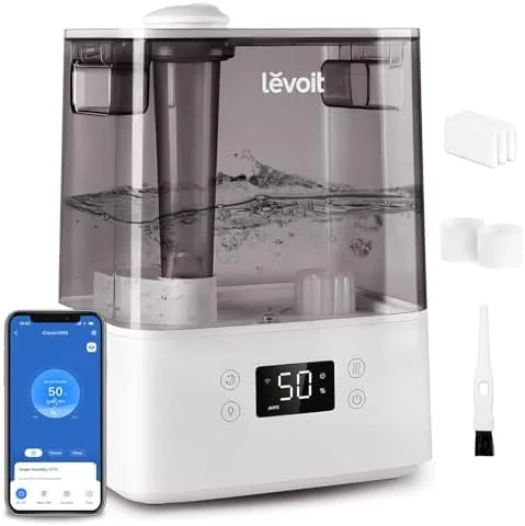 The Levoit 6L humidifier standing on a bedside table with the water window visible