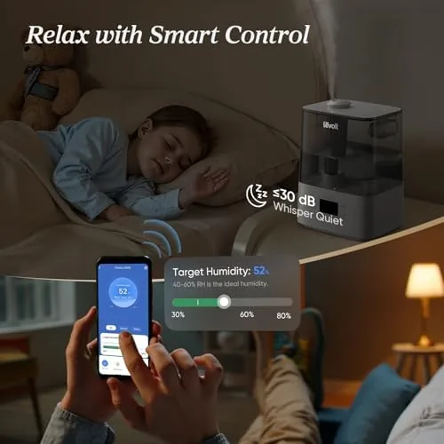 The humidifier on a dresser with the app control shown on a nearby phone