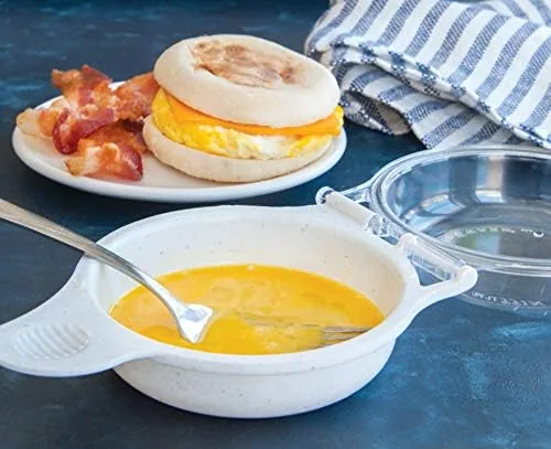 Close up of the divided cooking sections in the white breakfast pan