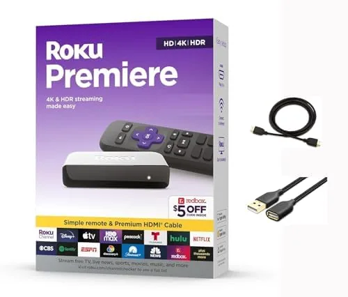 The Roku Premiere player beside a television with the remote in front