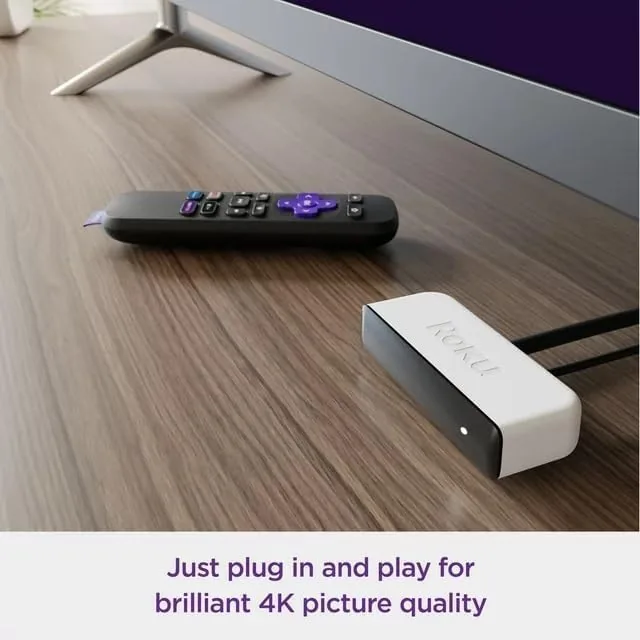 The Roku Premiere next to a streaming stick for size comparison