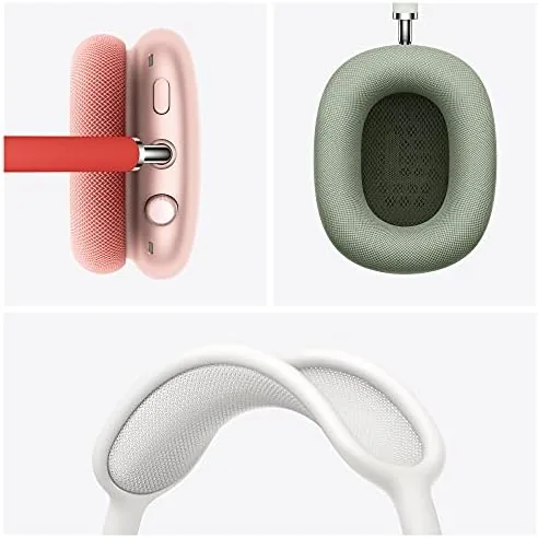 The AirPods Max charging via the lightning cable beside a laptop showing battery status