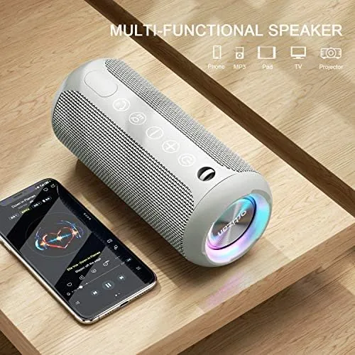 The Ortizan speaker next to a larger premium speaker for size comparison
