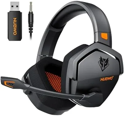 The orange NUBWO wireless gaming headset on a desk next to a PC