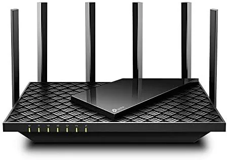The TP-Link Archer AX73 router with its six antennas standing upright