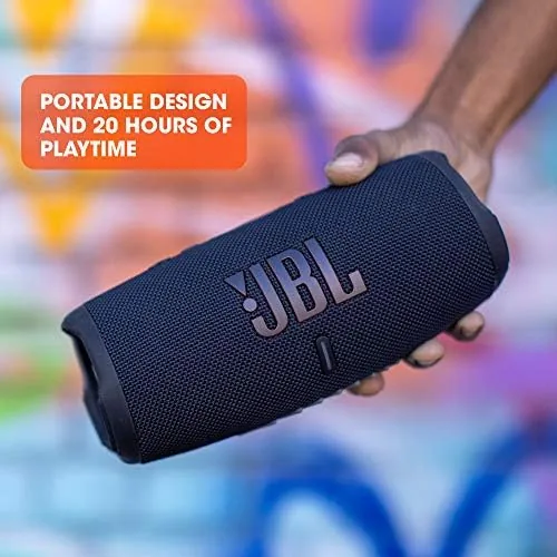 The Charge 5 speaker beside a phone showing the Bluetooth pairing screen