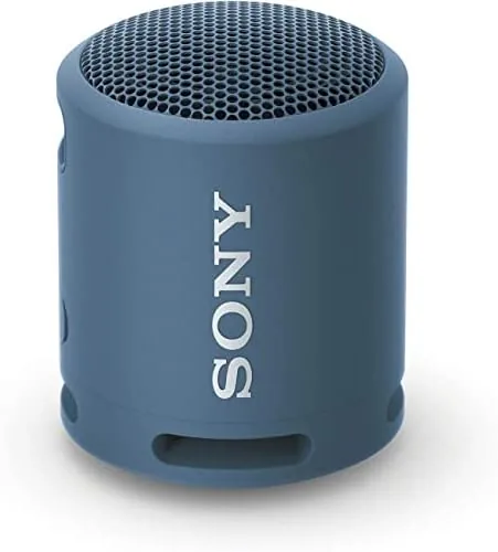 Sony SRS-XB13 speaker in light blue hanging from a backpack strap