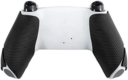 A gamer playing a shooter with the gripped PS5 controller at a desk