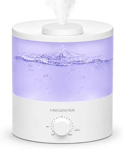 The Megawise cool mist humidifier on a nightstand with the ambient light on