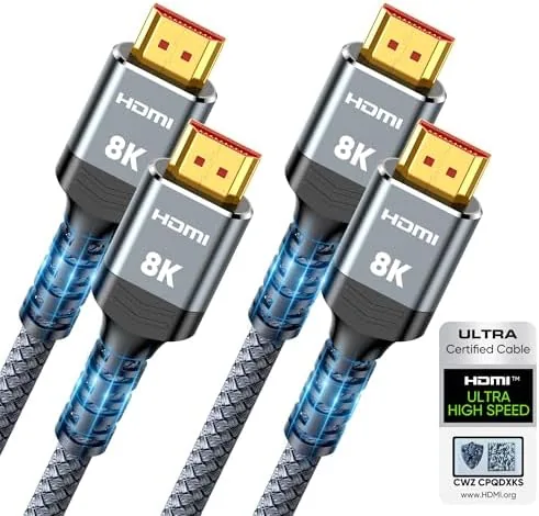 Highwings braided HDMI 2.1 cable coiled on a desk with the gold plated connectors visible