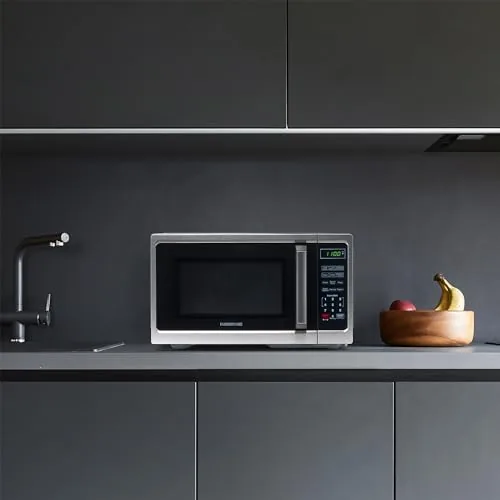 Farberware microwave compared side by side with a full size microwave