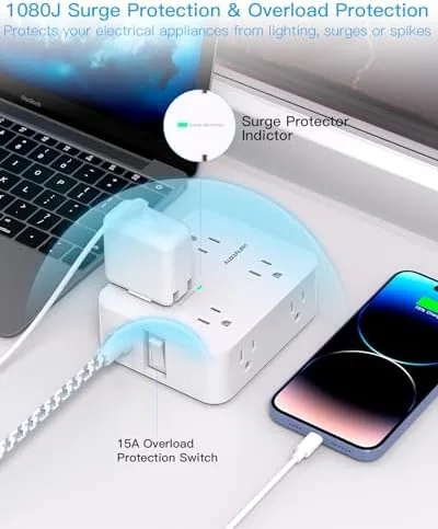 Home office desk powered by the HANYCONY power strip with monitor and laptop connected