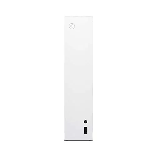 Xbox Series S console in a bedroom setup with a controller on a nearby desk