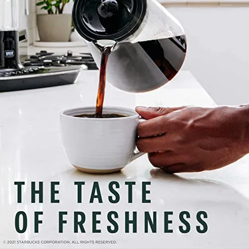 French press full of brewed Italian Roast coffee being pressed