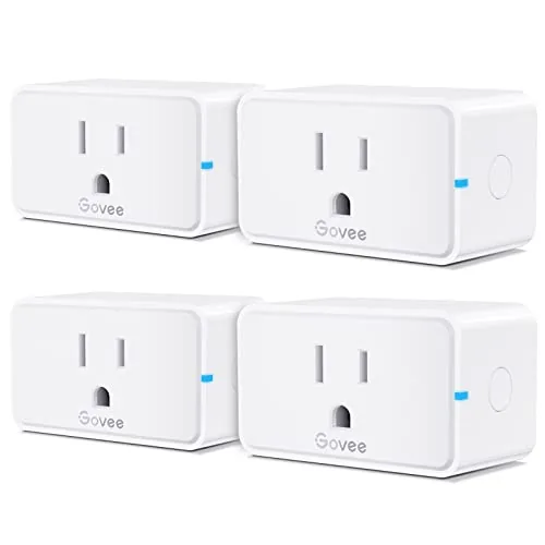 Four Govee smart plugs from the 15A 4 pack laid out together