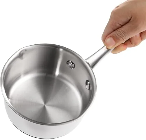 Melted butter in the DEAYOU pan pouring cleanly from a spout