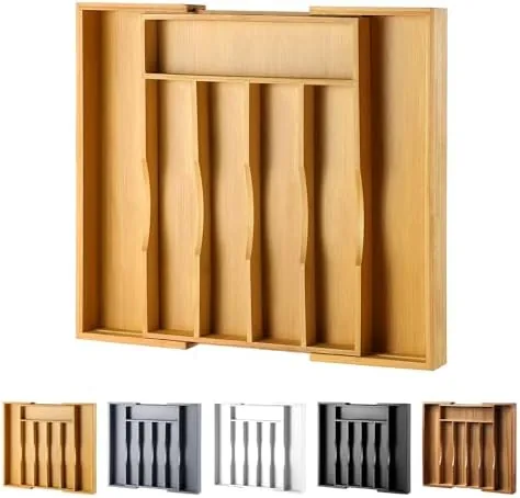The expandable bamboo drawer organizer fitted in a kitchen drawer